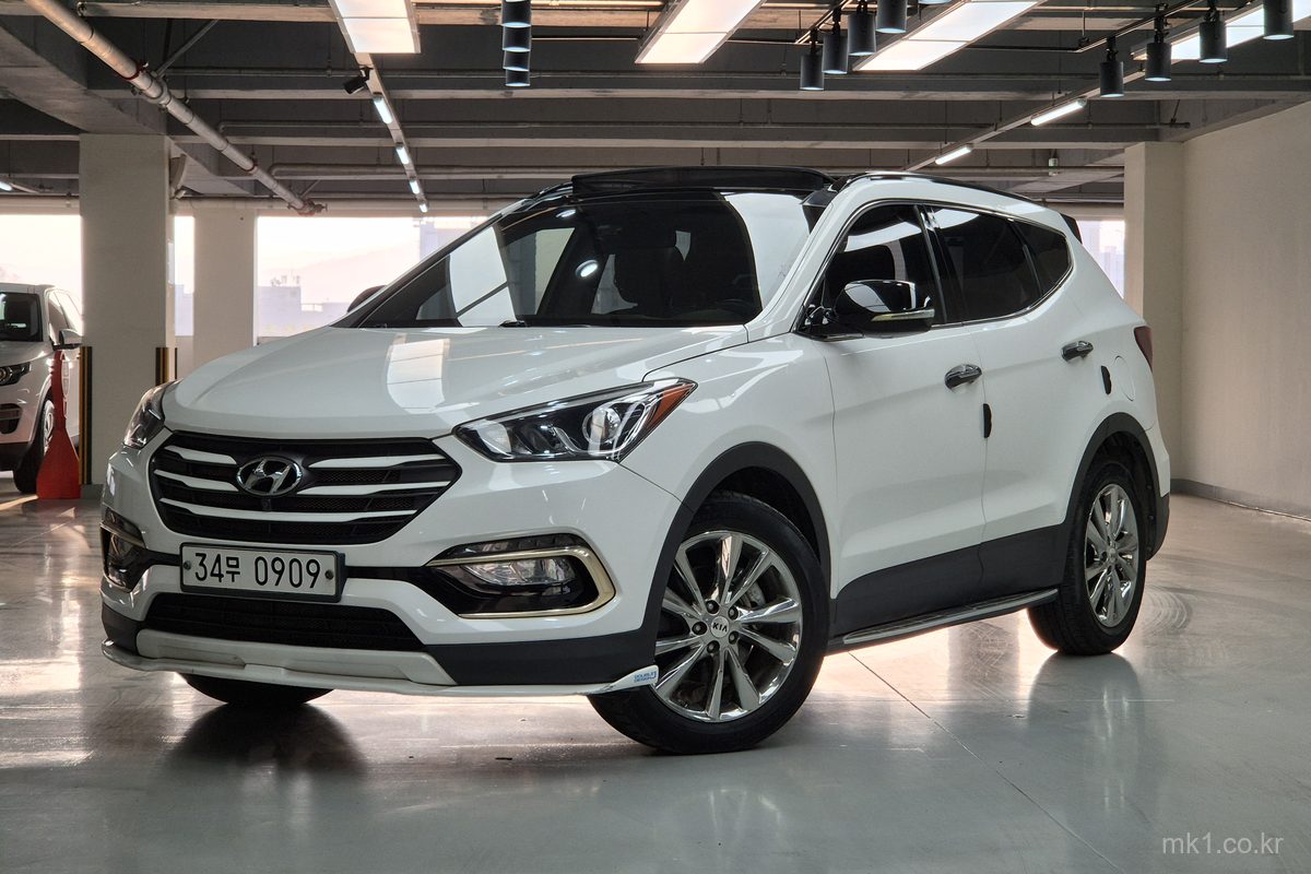 2016 Hyundai Santa Fe The Prime, front three-quarter view